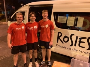 Padua college students on outreach sharing friendship with the Rosies van